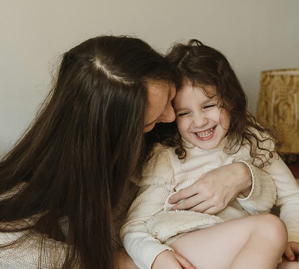 Smiling mom and child